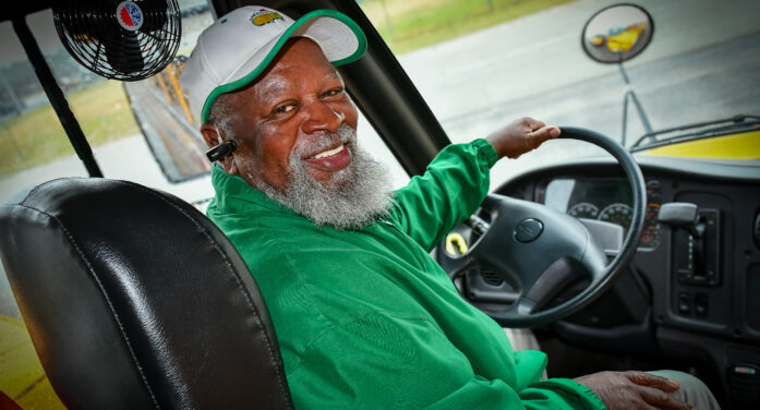 DISTRICT BUS DRIVER RUFUS HILLARY SHARES JOY WHILE SERVING STUDENTS, ENSURING SAFETY